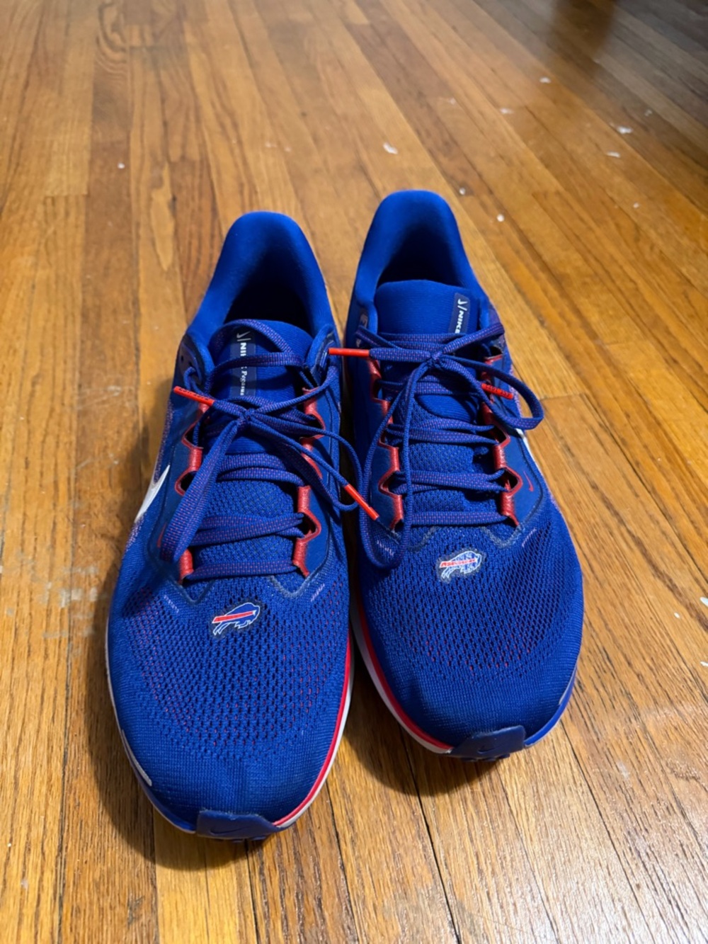 Nike Blue Sneakers with Red Accents